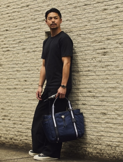 菅谷 哲也